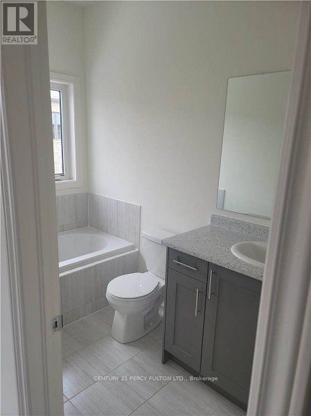 15 Truffle Court, Brampton, Ontario  L1A 5A6 - Photo 6 - W12537854