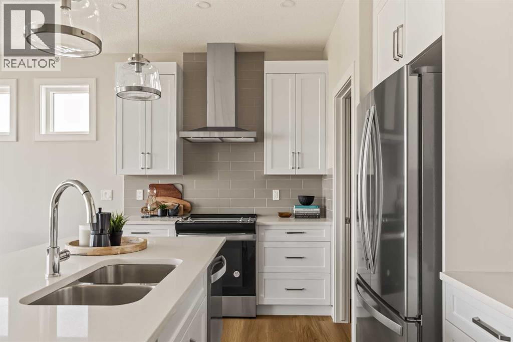 1168 Iron Ridge Avenue, Crossfield, Alberta  T0T 0T0 - Photo 4 - A2255632