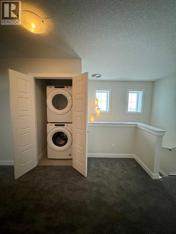 150 Edith Green Nw, Calgary, Alberta  T3R 2B5 - Photo 15 - A2265632