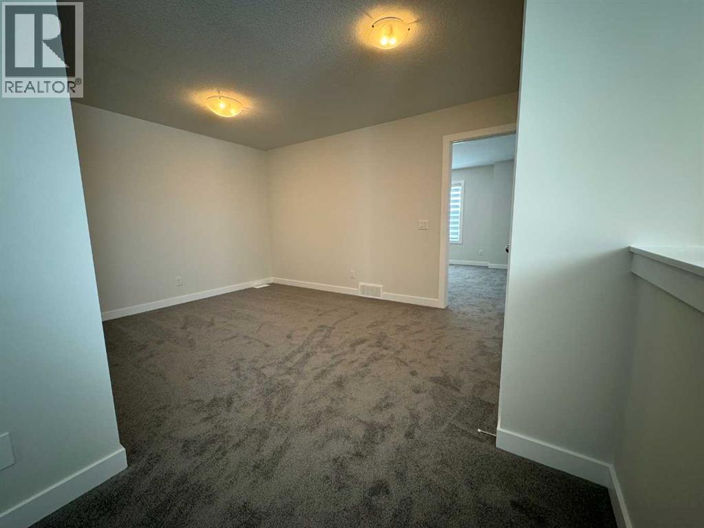 150 Edith Green Nw, Calgary, Alberta  T3R 2B5 - Photo 9 - A2265632