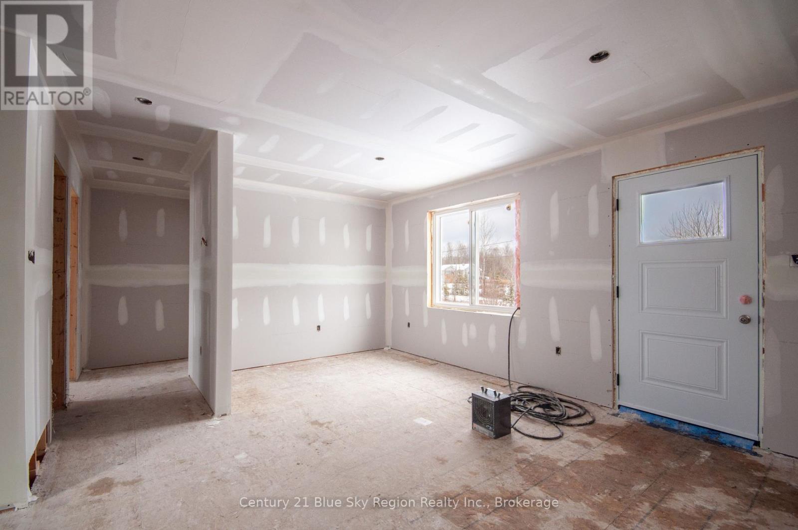 201 Talon Crescent, Bonfield, Ontario  P0H 2E0 - Photo 4 - X12538260