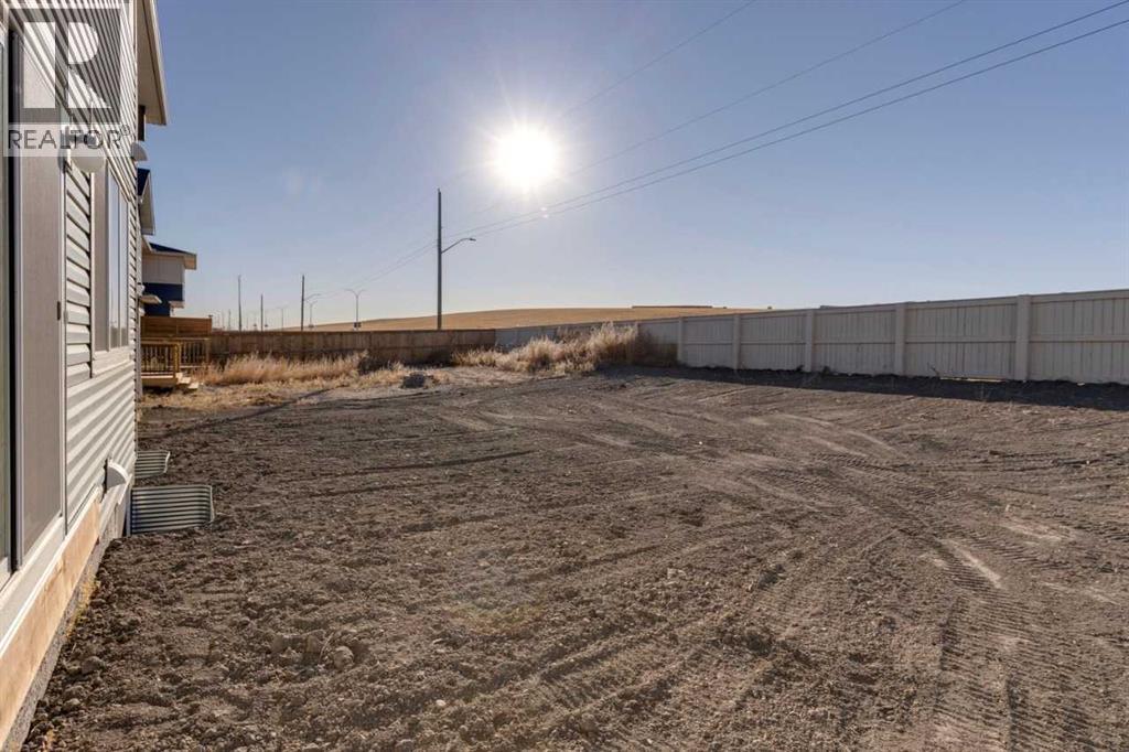 1477 Bayview Point Sw, Airdrie, Alberta  T4B 3N8 - Photo 7 - A2262865