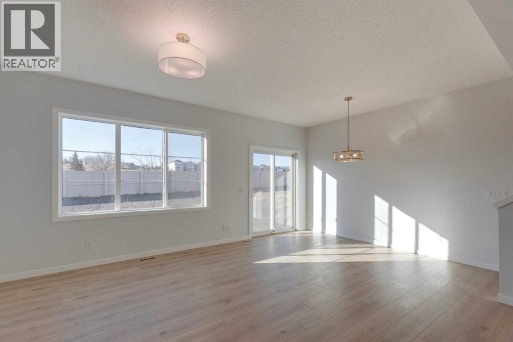 1477 Bayview Point Sw, Airdrie, Alberta  T4B 3N8 - Photo 10 - A2262865