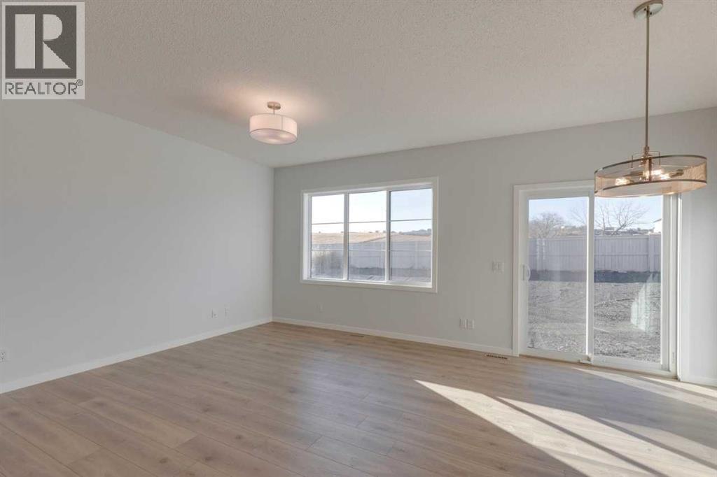 1477 Bayview Point Sw, Airdrie, Alberta  T4B 3N8 - Photo 12 - A2262865