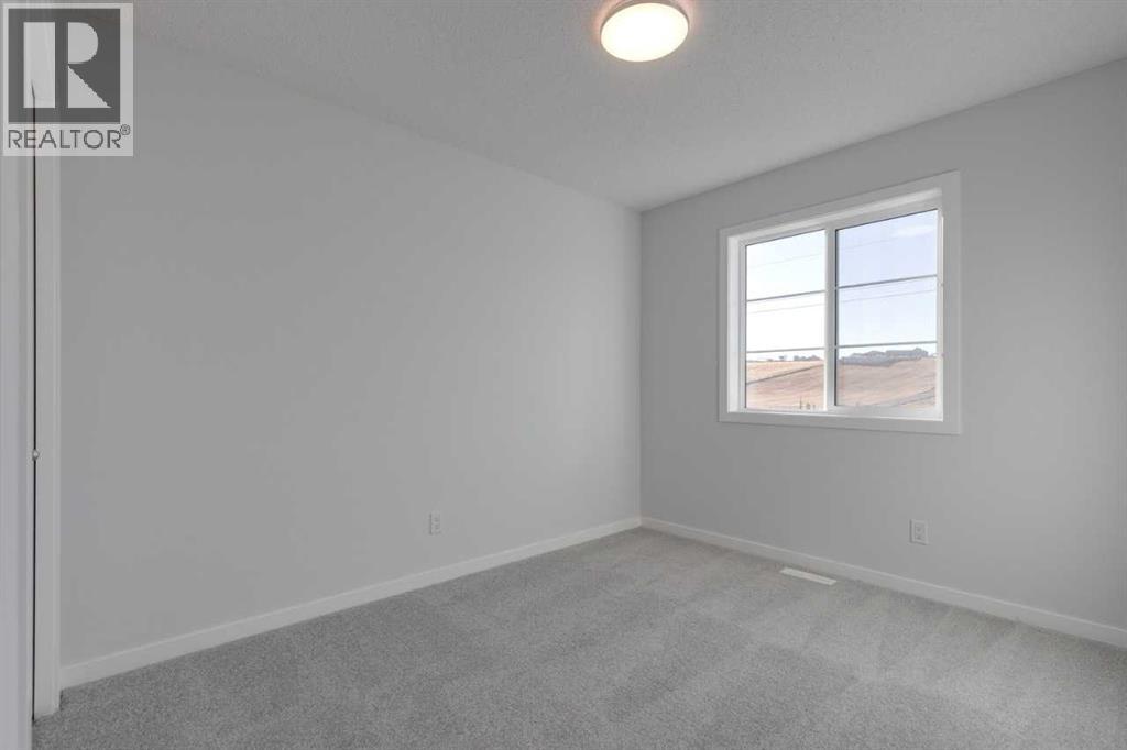 1477 Bayview Point Sw, Airdrie, Alberta  T4B 3N8 - Photo 20 - A2262865