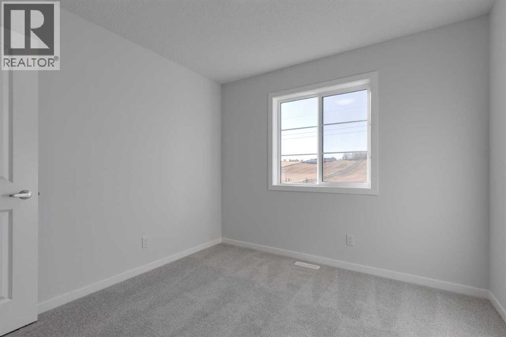 1477 Bayview Point Sw, Airdrie, Alberta  T4B 3N8 - Photo 22 - A2262865