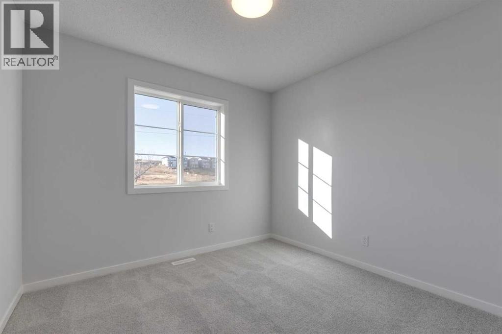 1477 Bayview Point Sw, Airdrie, Alberta  T4B 3N8 - Photo 21 - A2262865