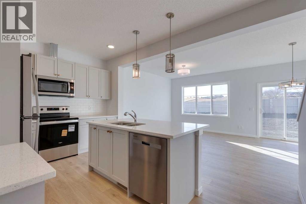 1477 Bayview Point Sw, Airdrie, Alberta  T4B 3N8 - Photo 31 - A2262865