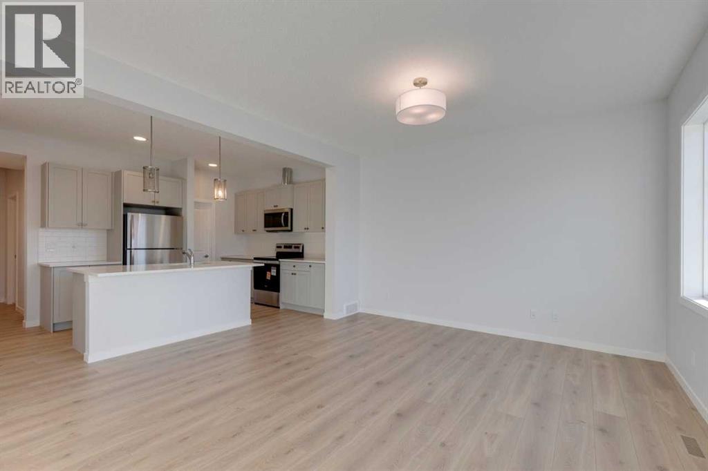 1477 Bayview Point Sw, Airdrie, Alberta  T4B 3N8 - Photo 33 - A2262865