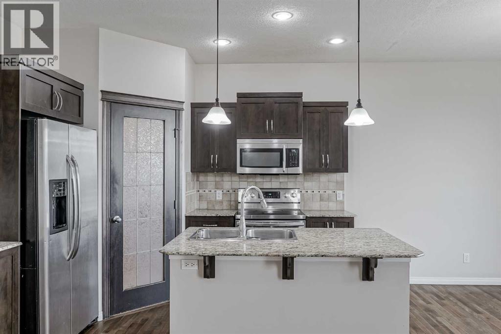 206 Pantego View Nw, Calgary, Alberta  T3K 0N7 - Photo 3 - A2270275