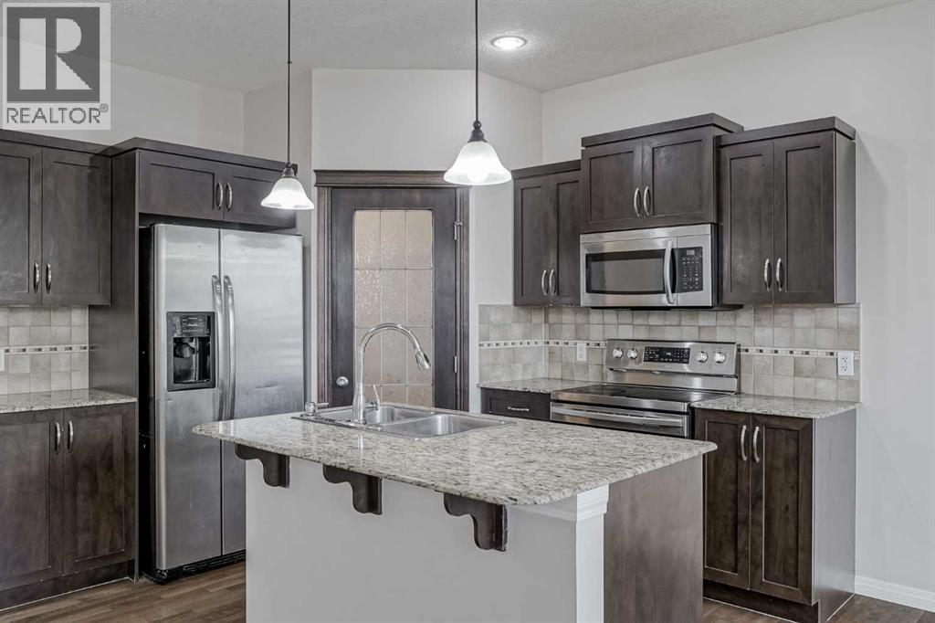 206 Pantego View Nw, Calgary, Alberta  T3K 0N7 - Photo 4 - A2270275