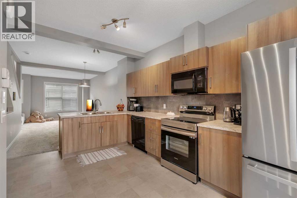 34 New Brighton Point Se, Calgary, Alberta  T2Z 1B6 - Photo 4 - A2269802