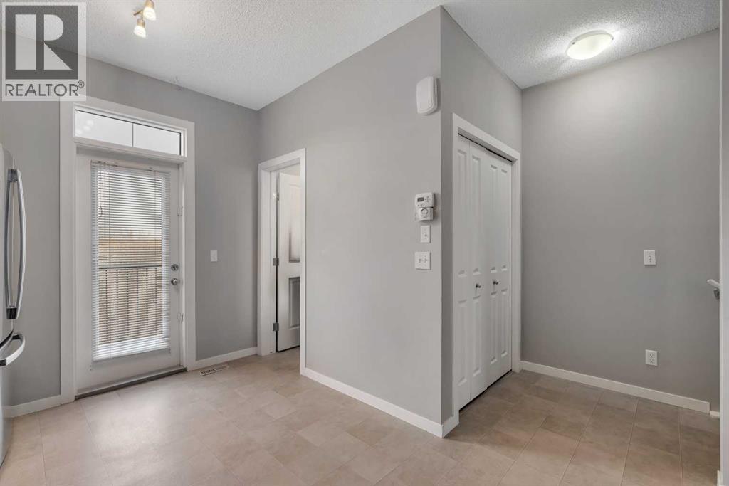 34 New Brighton Point Se, Calgary, Alberta  T2Z 1B6 - Photo 5 - A2269802