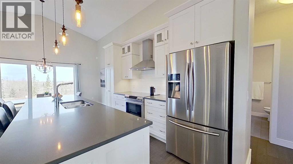 130 Riverwood Crescent Sw, Diamond Valley, Alberta  T0L 0H0 - Photo 6 - A2268597