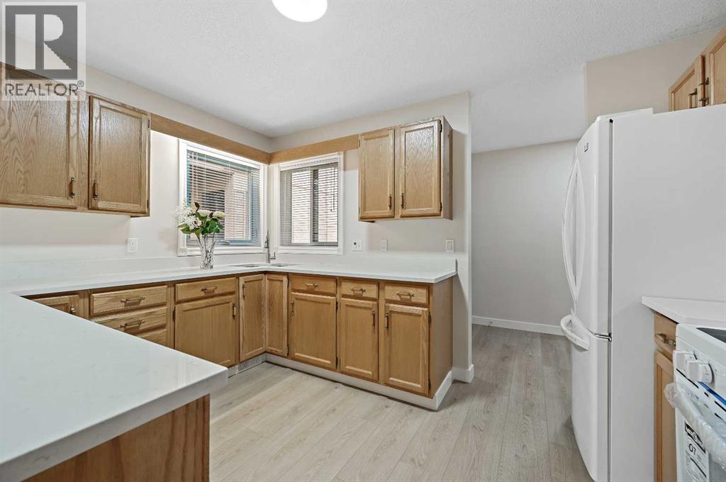 22 Sandarac Circle Nw, Calgary, Alberta  T3K 3G7 - Photo 2 - A2269992