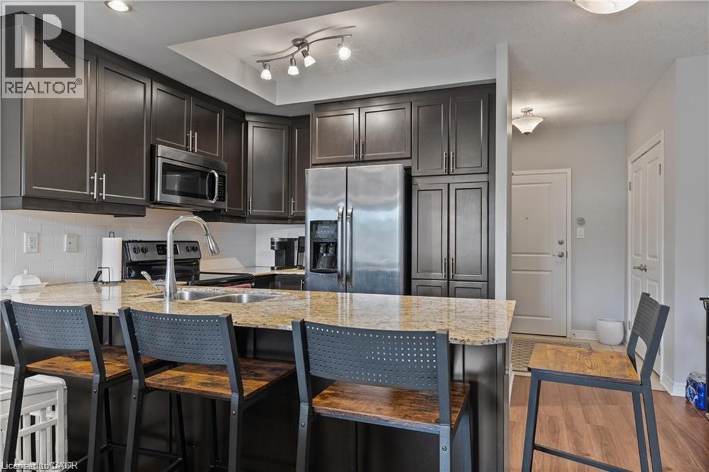 539 Belmont Avenue W Unit# 210, Kitchener, Ontario  N2M 0A2 - Photo 2 - 40779182