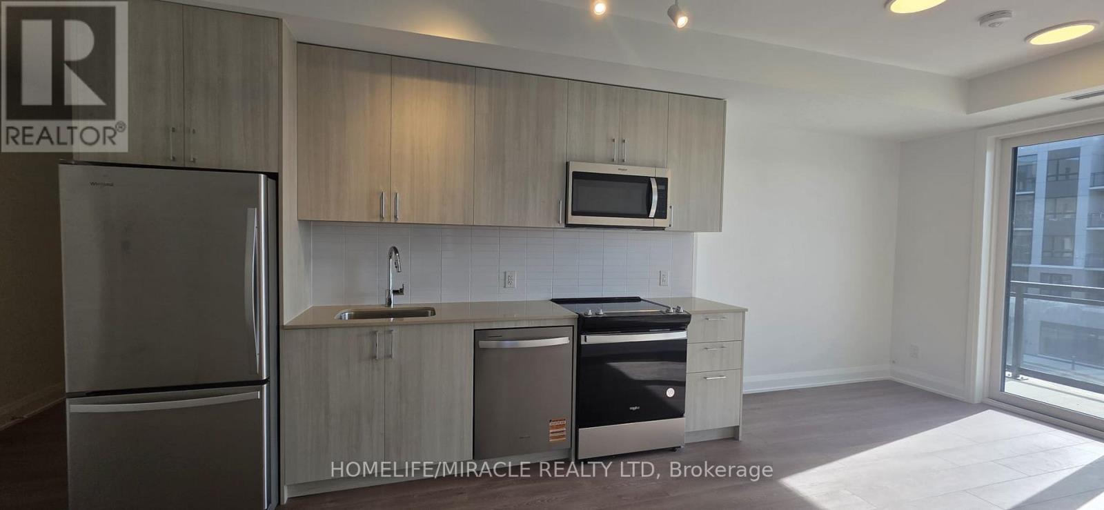 311 - 3250 Carding Mill Trail, Oakville, Ontario  L6M 1L3 - Photo 5 - W12538684