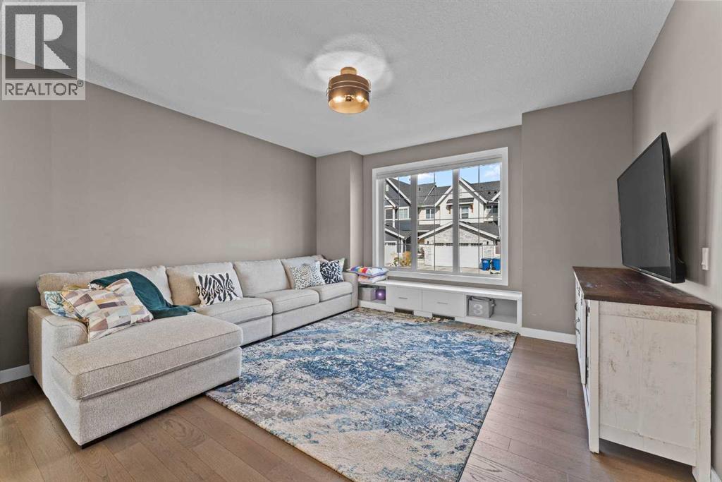 7 Cooperswood Court Sw, Airdrie, Alberta  T4B 5E9 - Photo 2 - A2262699