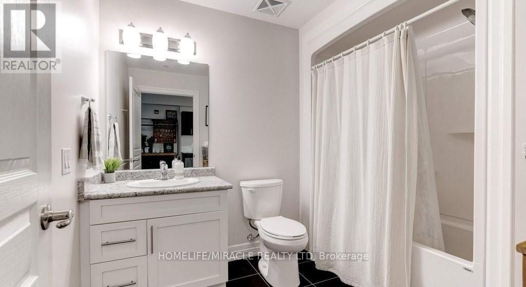 112 - 212 Lakeport Road, St. Catharines, Ontario L2N 0B4 - Photo 4 - X12539170