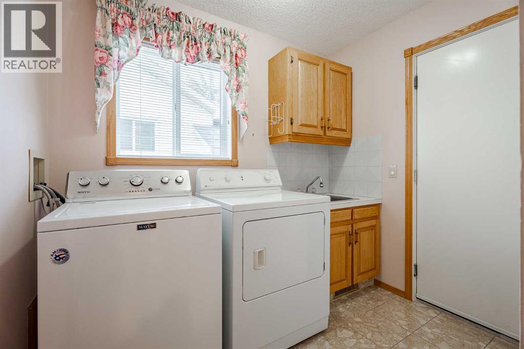 301 Riverview Green, Cochrane, Alberta  T4C 1K5 - Photo 21 - A2267736