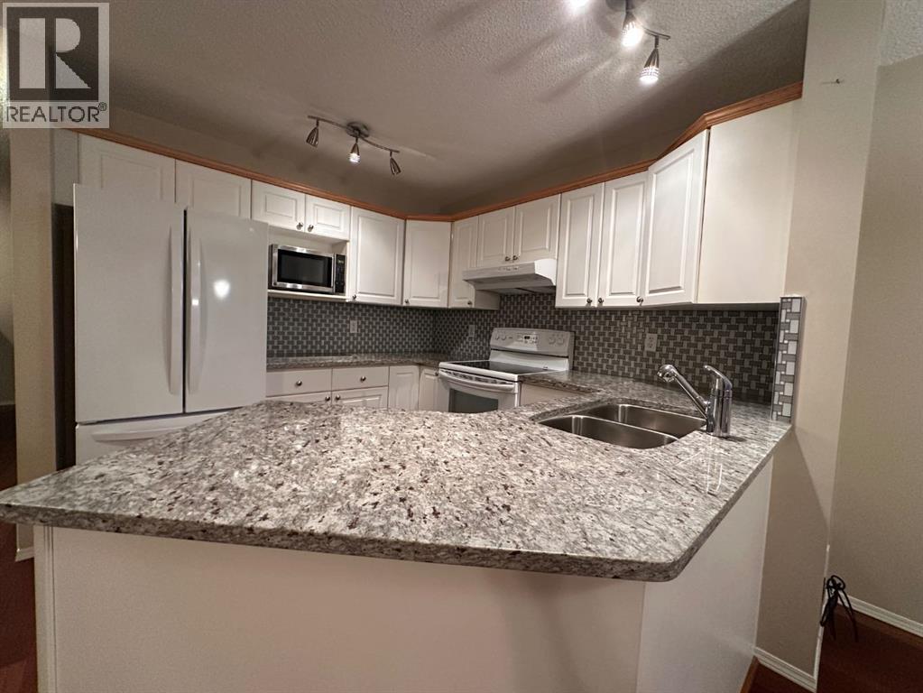 91 Covington Close, Calgary, Alberta  T3K 4M2 - Photo 6 - A2245013