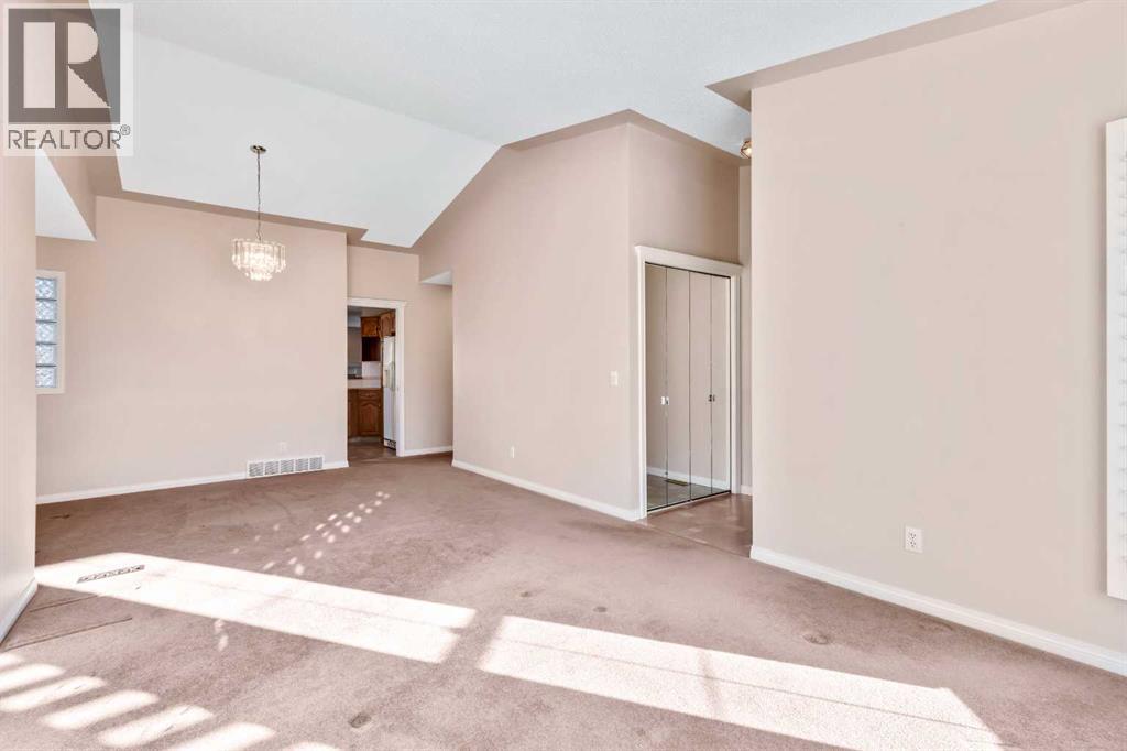 154 Sierra Morena Green Sw, Calgary, Alberta  T3H 3E4 - Photo 4 - A2269970