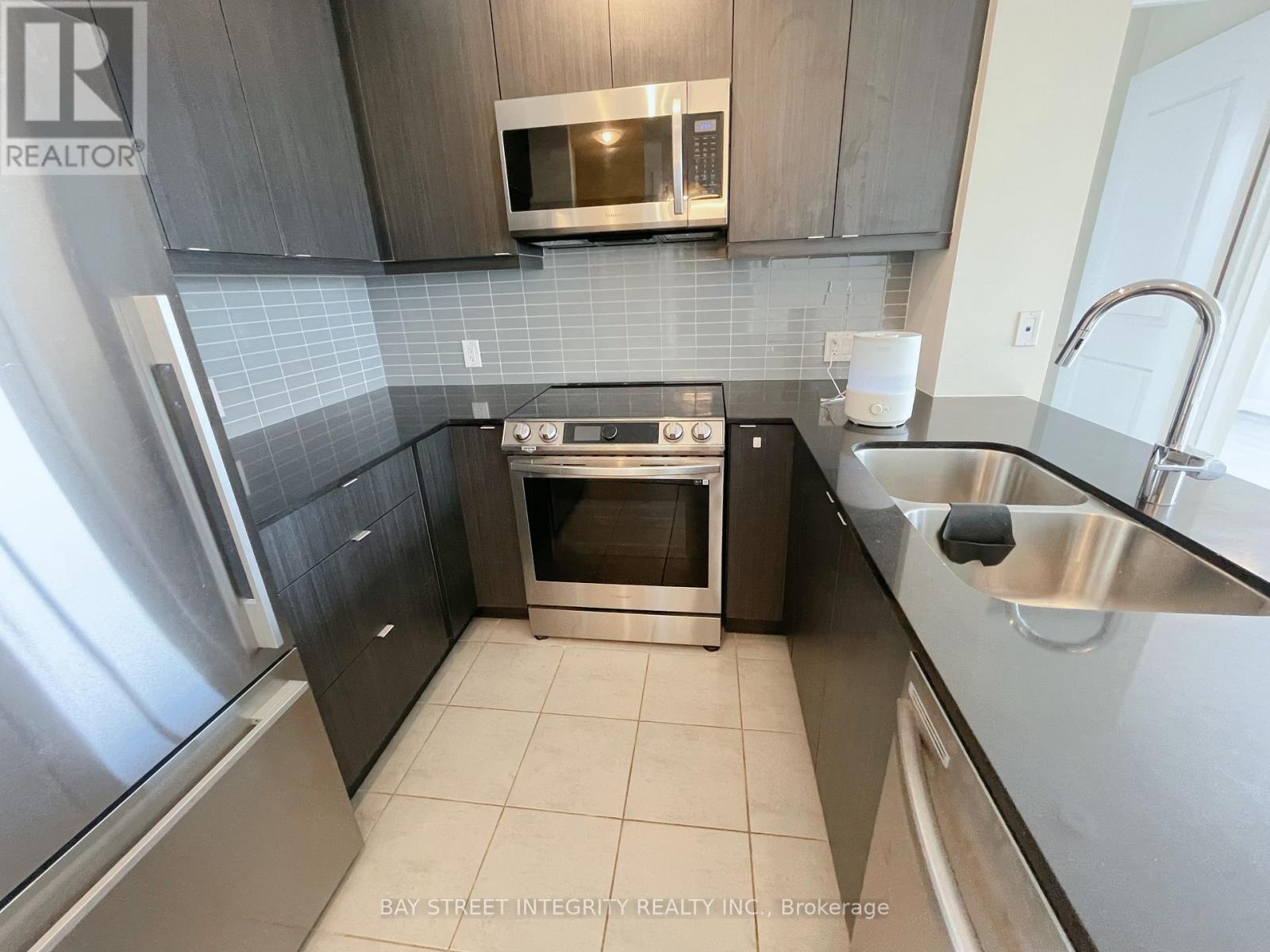 704 - 50 Thomas Riley Road, Toronto, Ontario  M9B 0C5 - Photo 5 - W12526256