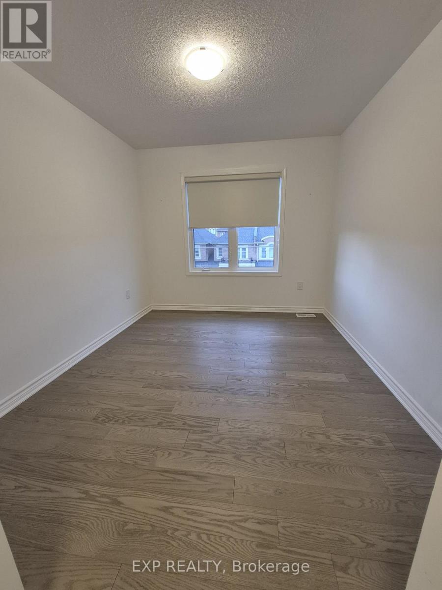 128 Marigold Gardens, Oakville, Ontario  L6H 7X7 - Photo 4 - W12539660