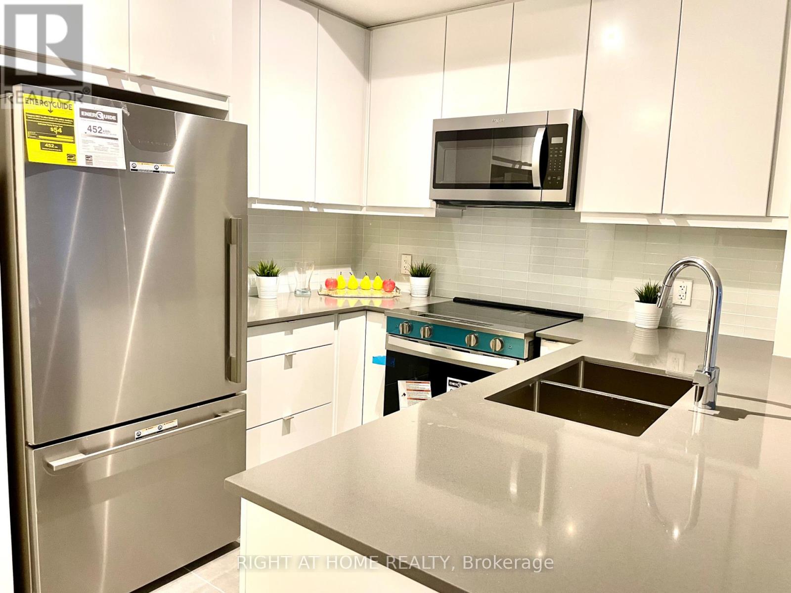 1405 - 3260 Sheppard Avenue E, Toronto, Ontario  M1T 3K3 - Photo 4 - E12539726