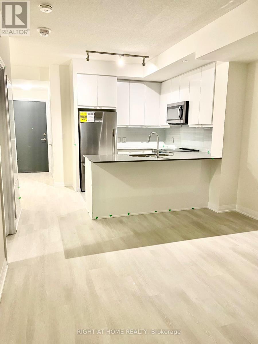 1405 - 3260 Sheppard Avenue E, Toronto, Ontario  M1T 3K3 - Photo 7 - E12539726