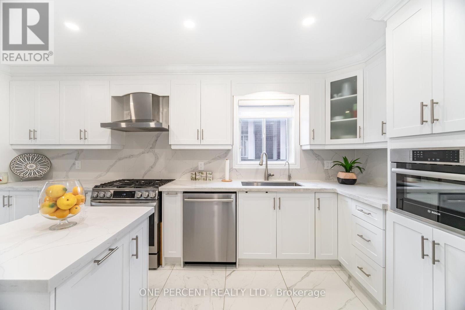 704 Bookham Crescent, Mississauga, Ontario L4Z 1T9 - Photo 6 - W12539818