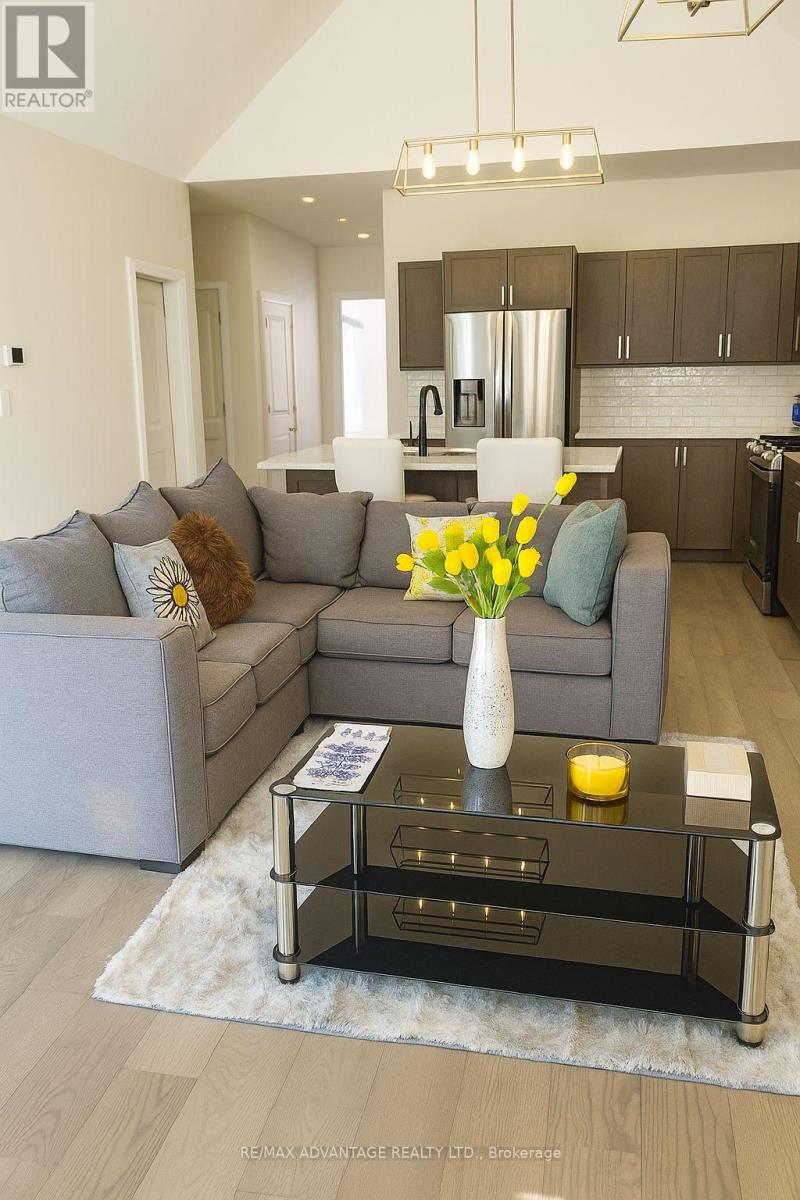 7 - 63 Compass Trail, Central Elgin, Ontario  N5L 0B4 - Photo 2 - X12540076