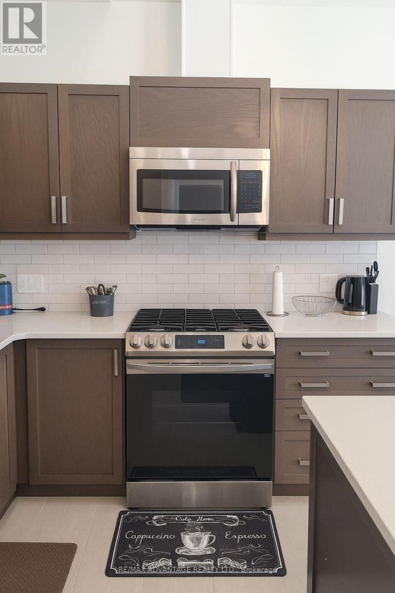 7 - 63 Compass Trail, Central Elgin, Ontario  N5L 0B4 - Photo 3 - X12540076