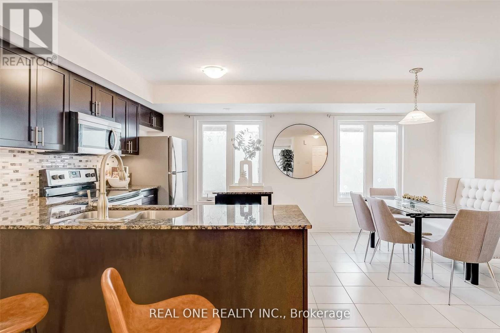 79 - 2280 Baronwood Drive, Oakville, Ontario  L6M 0K4 - Photo 2 - W12539962