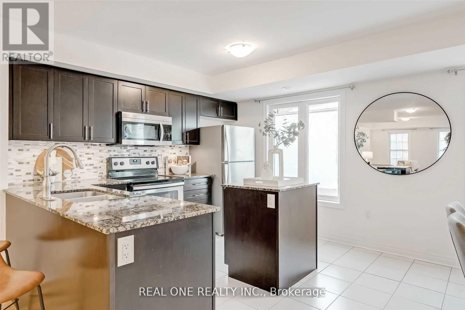 79 - 2280 Baronwood Drive, Oakville, Ontario  L6M 0K4 - Photo 4 - W12539962