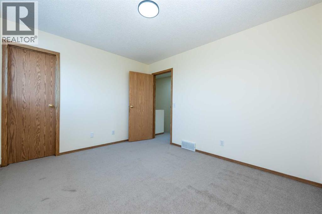 216 Hidden Hills Road Nw, Calgary, Alberta  T3A 5Y1 - Photo 18 - A2256233