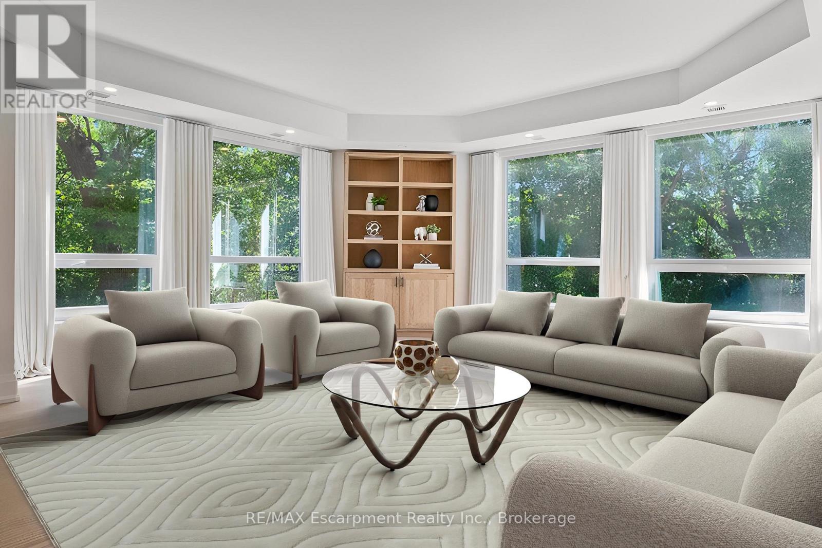 103 - 40 Old Mill Road, Oakville, Ontario  L6J 7W2 - Photo 5 - W12498242