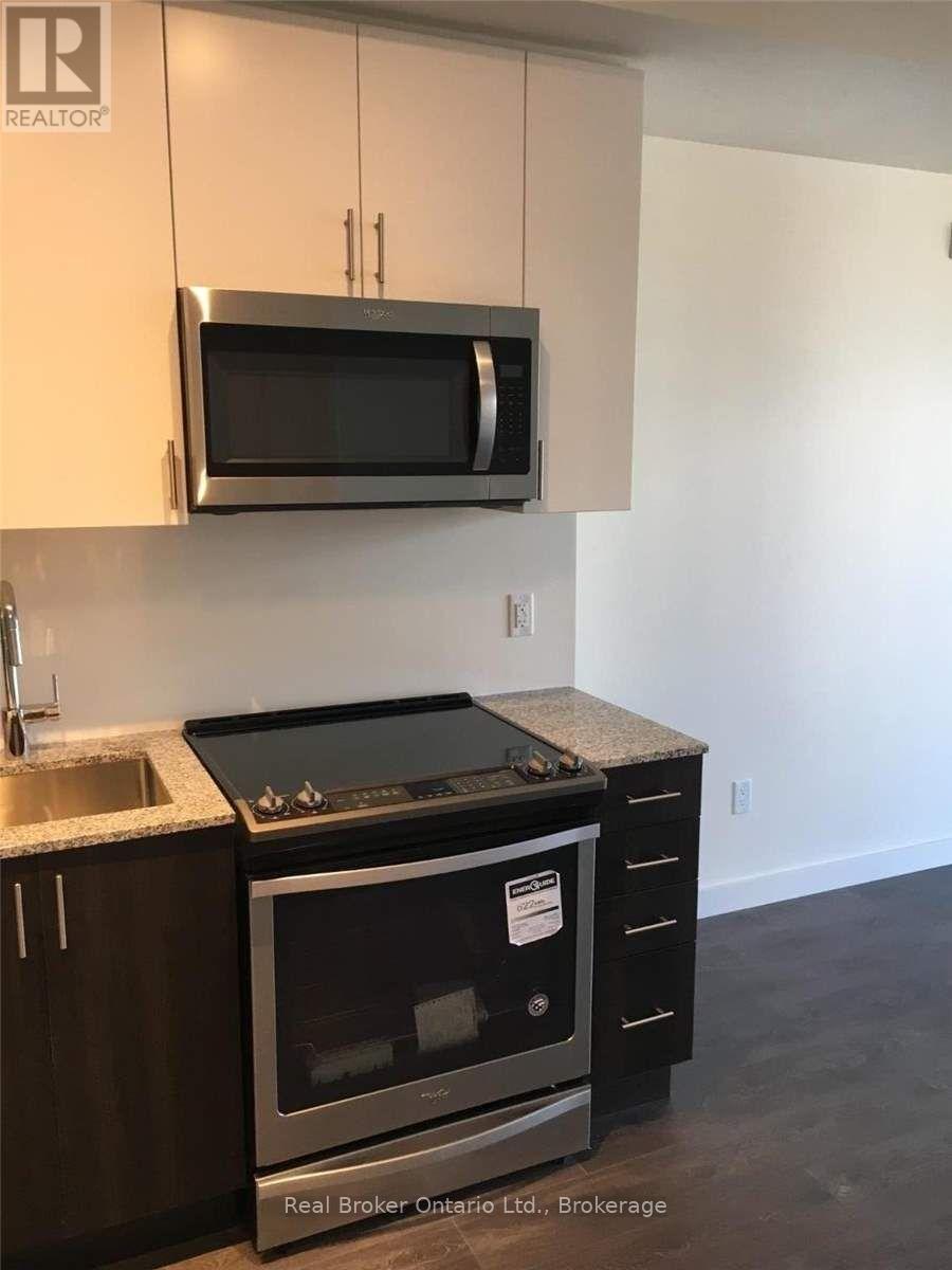 311 - 210 Sabina Drive, Oakville, Ontario  L6H 0W6 - Photo 10 - W12540620