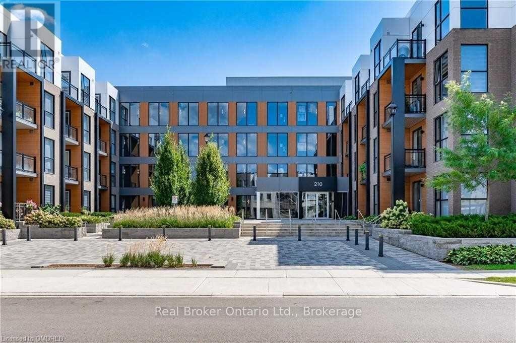 311 - 210 Sabina Drive, Oakville, Ontario  L6H 0W6 - Photo 2 - W12540620