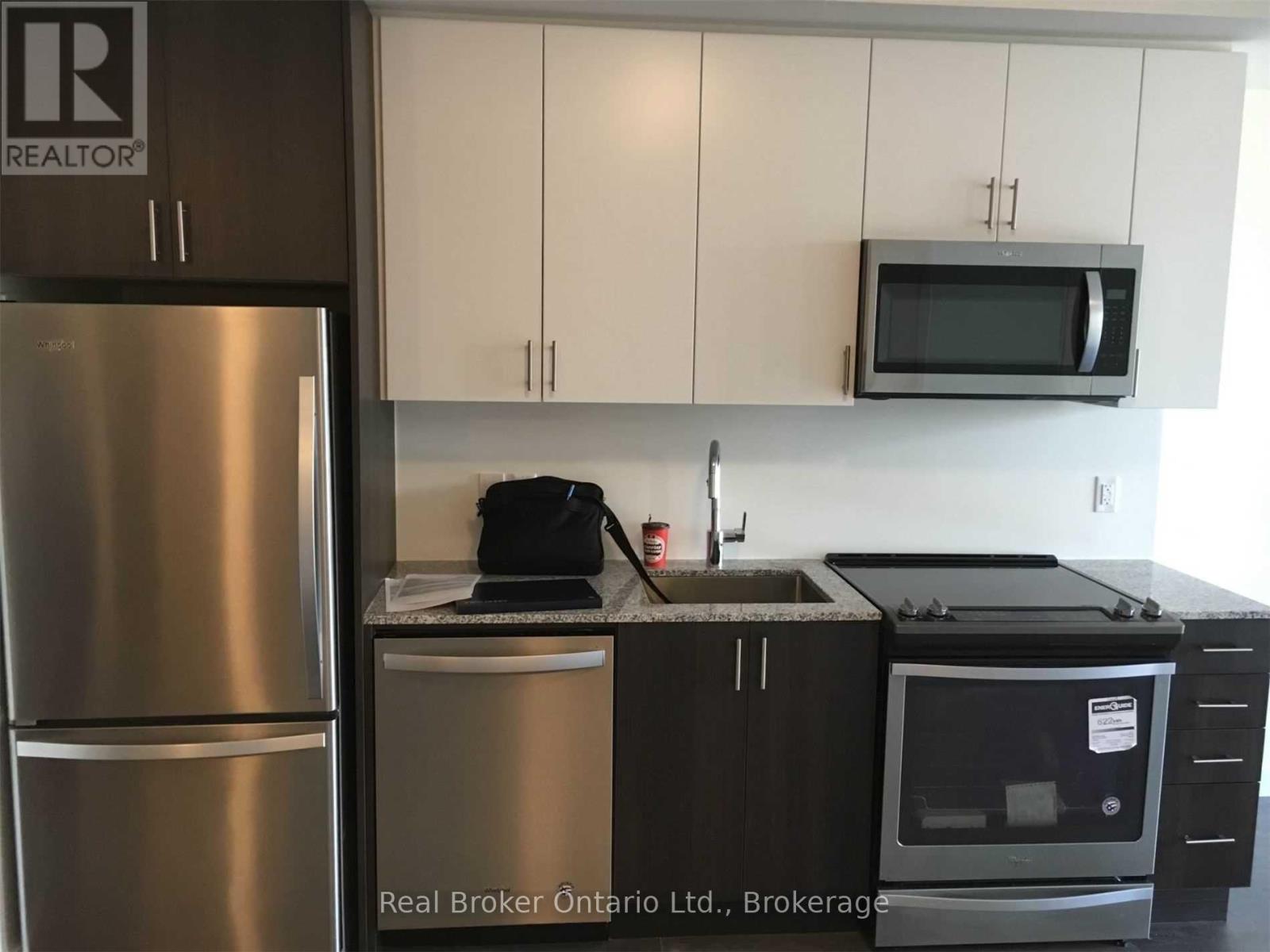 311 - 210 Sabina Drive, Oakville, Ontario  L6H 0W6 - Photo 9 - W12540620