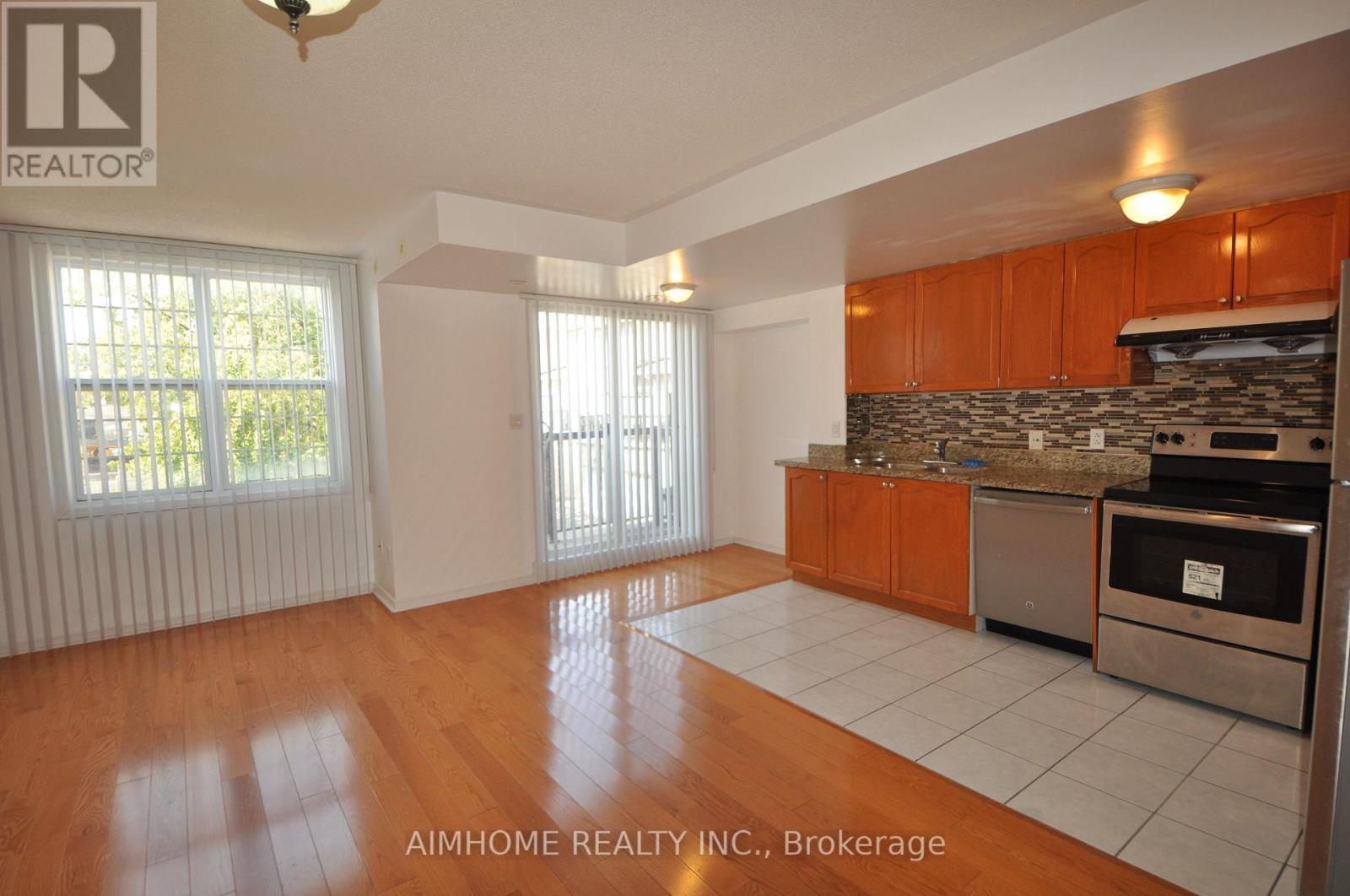 311 - 15 Strangford Lane, Toronto, Ontario  M1L 0E5 - Photo 3 - E12540798