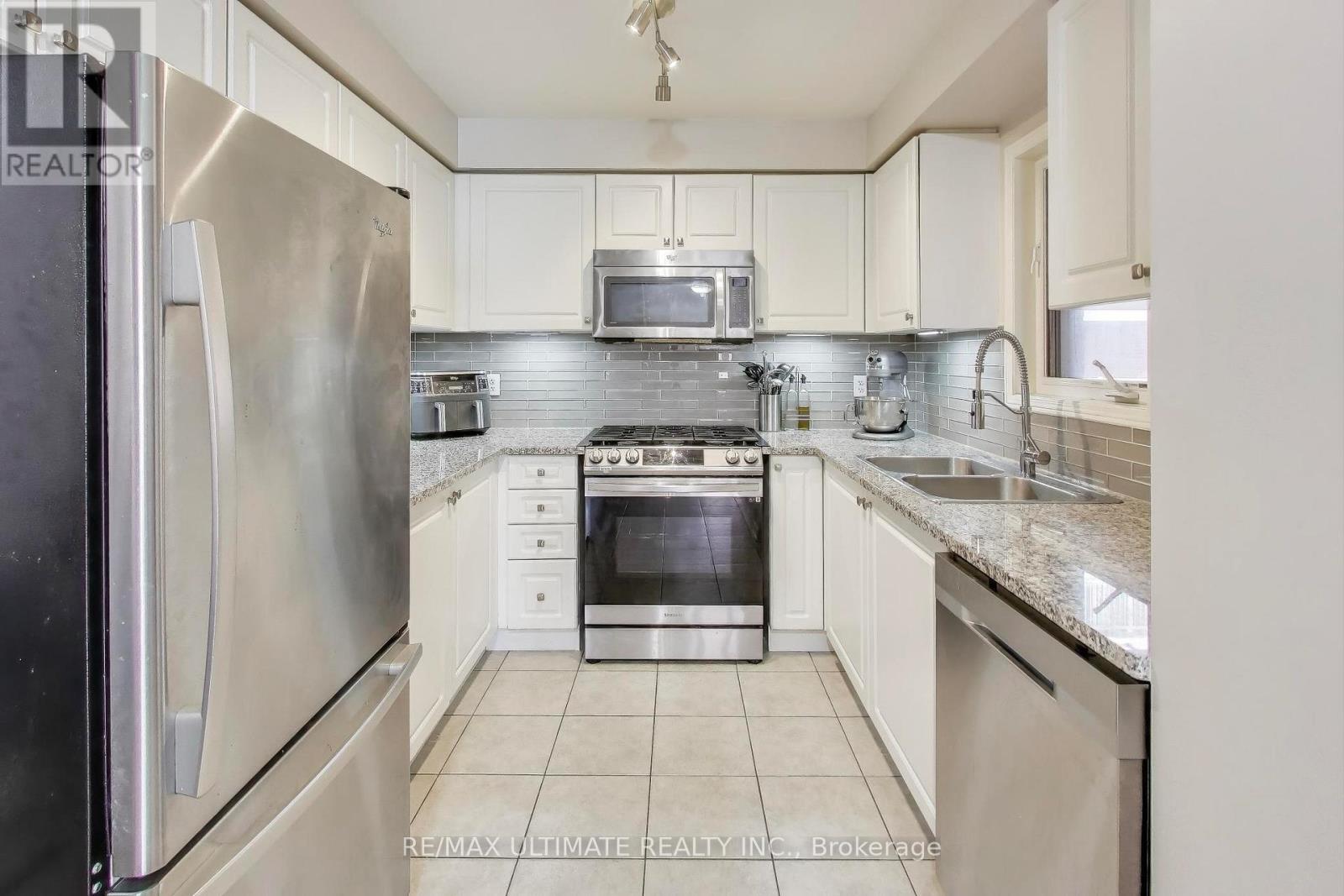 8 Odoardo Disanto Circle, Toronto, Ontario  M3L 0E7 - Photo 7 - W12540764