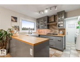 6815 11 AV NW Menisa