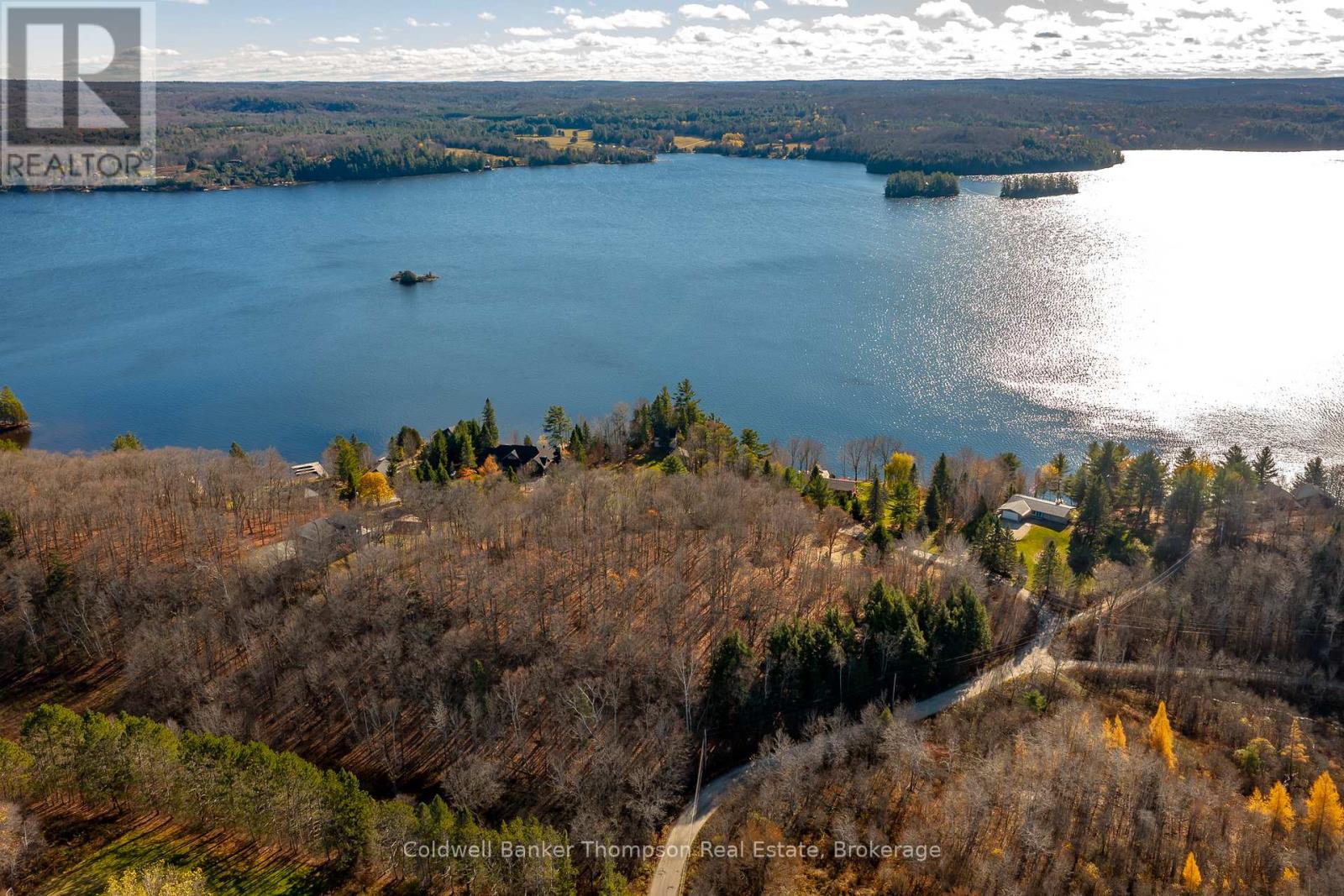 210 Allisons Point Road, Huntsville, Ontario P1H 1B5 - Photo 2 - X12541386