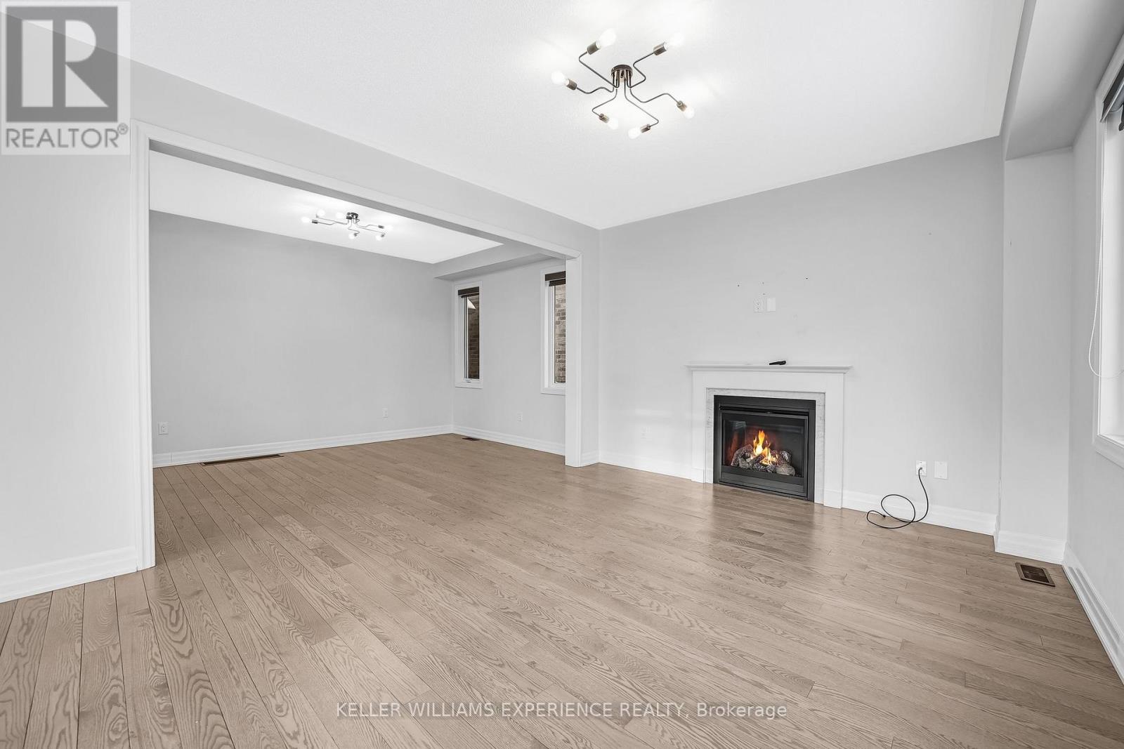 31 Wood Crescent, Essa, Ontario  L3W 0M5 - Photo 5 - N12541282