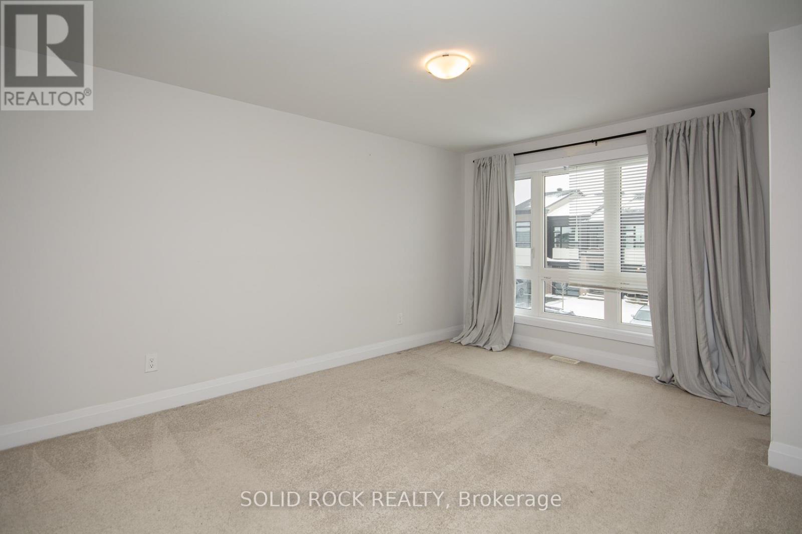 218 Lift Lane, Ottawa, Ontario  K2V 0M6 - Photo 12 - X12541710