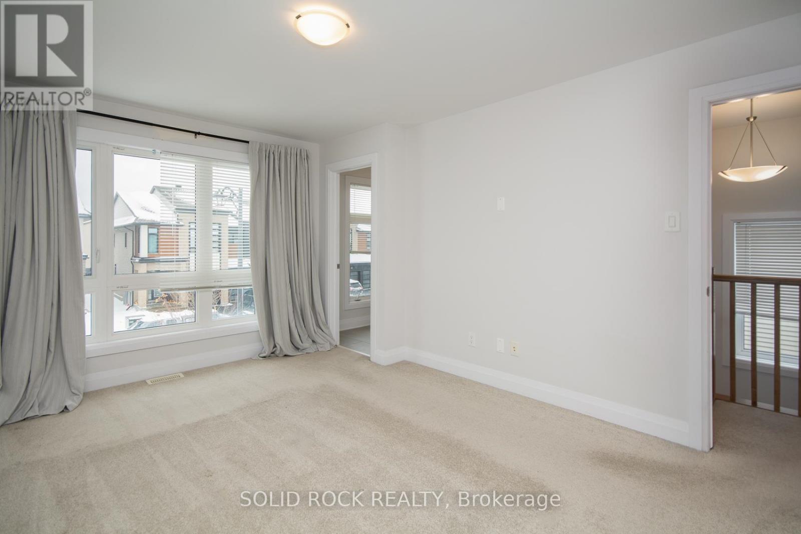 218 Lift Lane, Ottawa, Ontario  K2V 0M6 - Photo 13 - X12541710