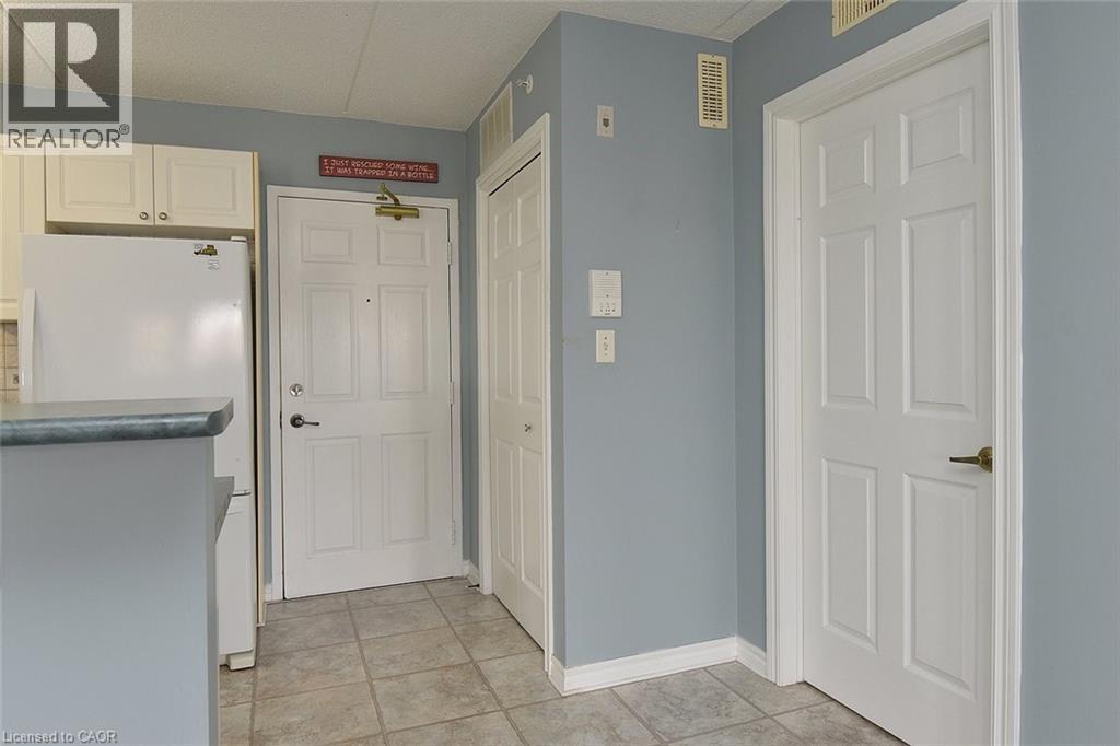 1421 Walkers Line Unit# 203, Burlington, Ontario L7M 4P4 - Photo 2 - 40788113