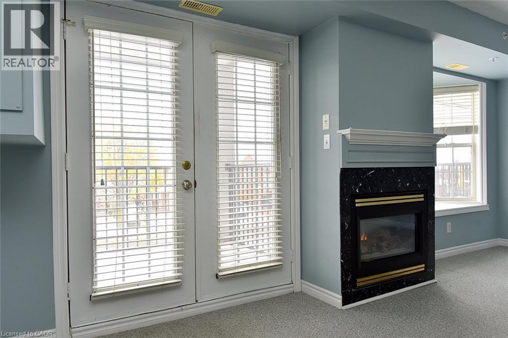 1421 Walkers Line Unit# 203, Burlington, Ontario L7M 4P4 - Photo 3 - 40788113