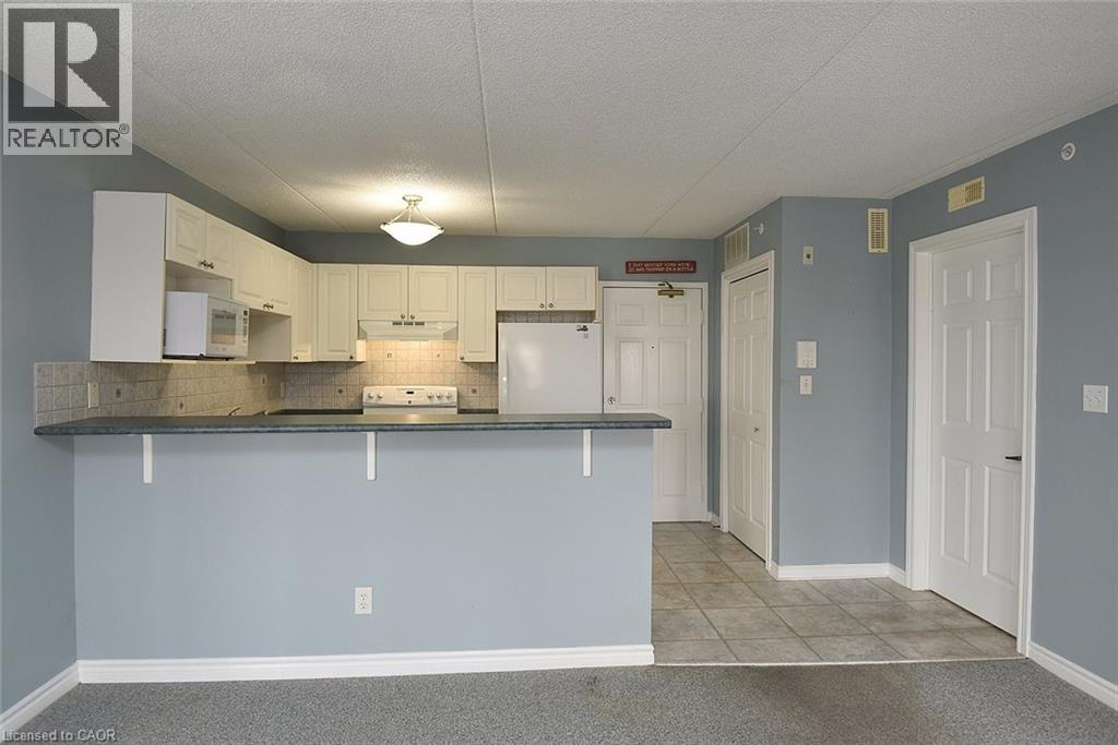 1421 Walkers Line Unit# 203, Burlington, Ontario L7M 4P4 - Photo 18 - 40788113